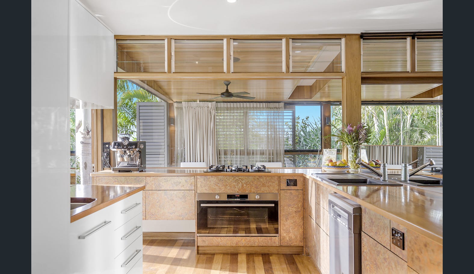 The large Elysian kitchen with two sinks and broad benches